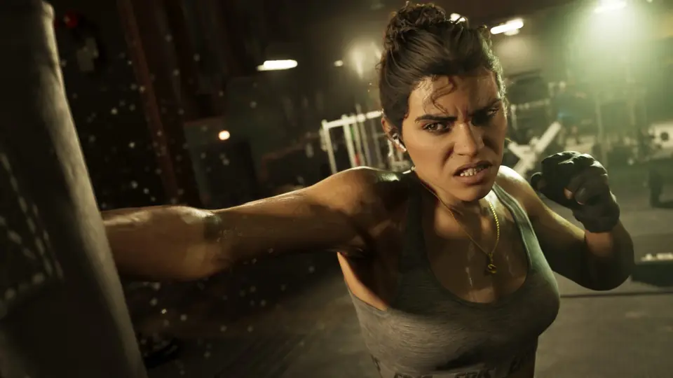 Lucia Caminos lanzando un puñetazo con guantes de entrenamiento, en una captura oficial de GTA VI.