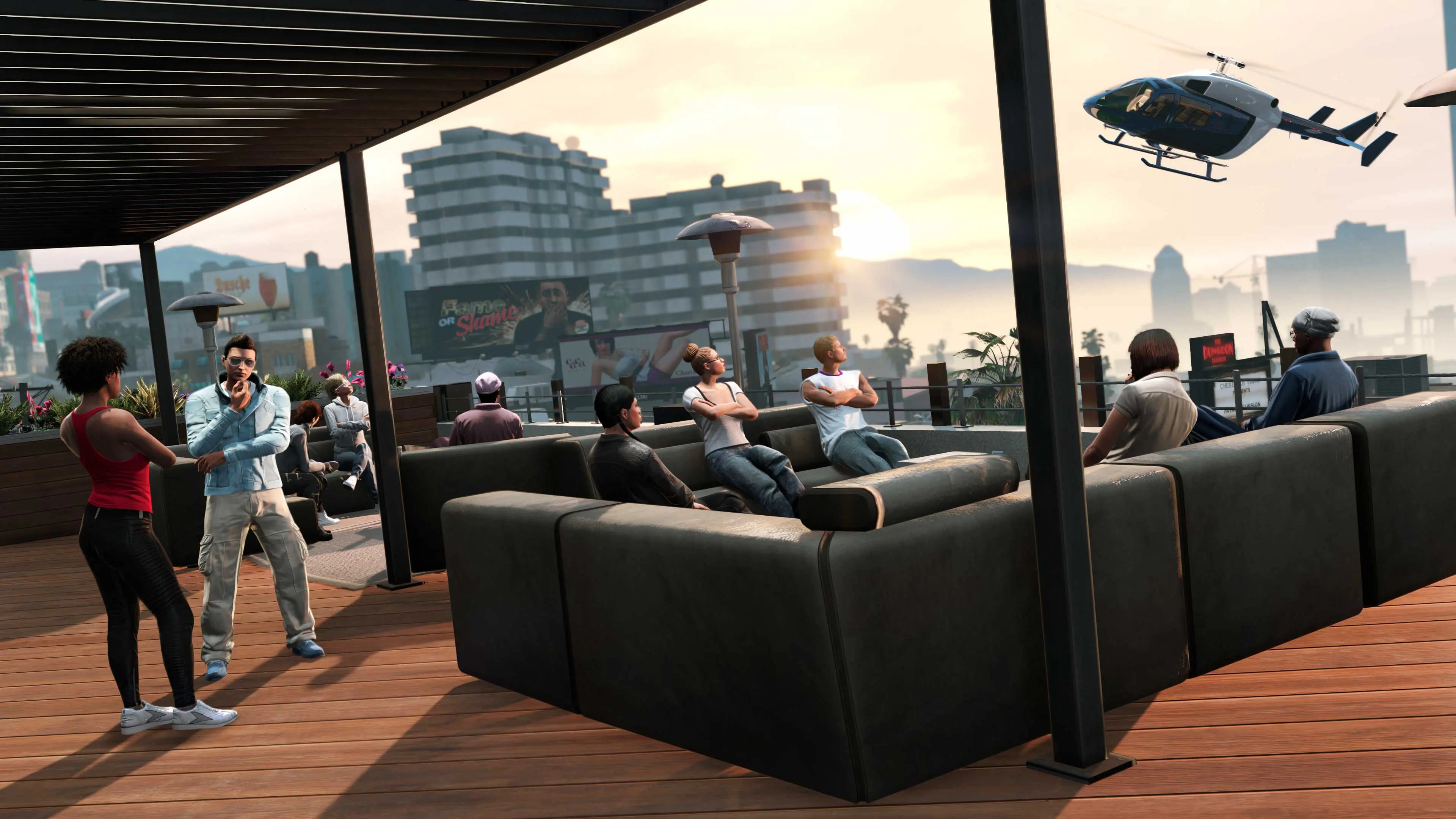 GTA Online characters chatting on the Eclipse Blvd Garage rooftop terrace as a helicopter flies over.