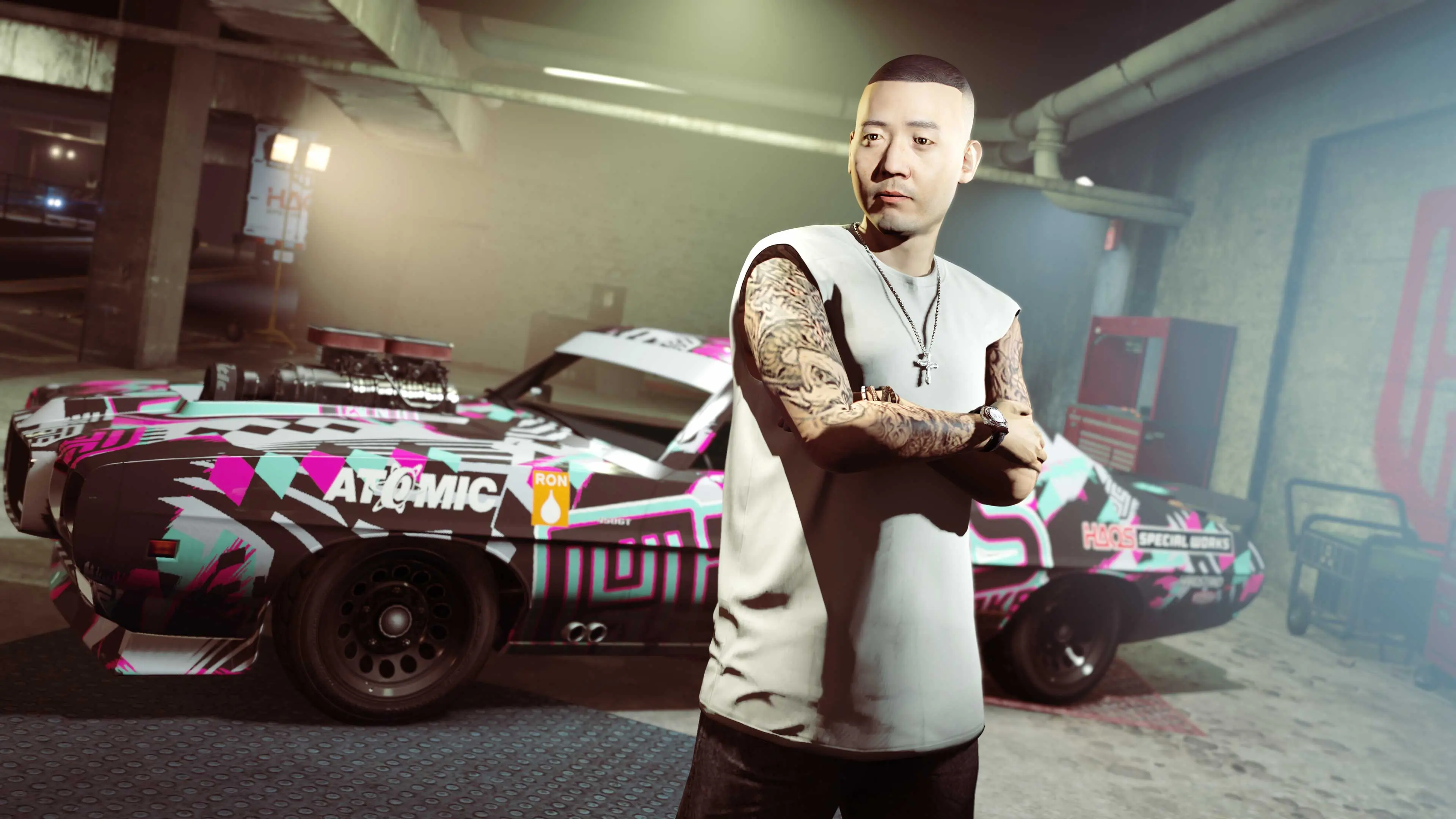 Hao standing next to a modified car.